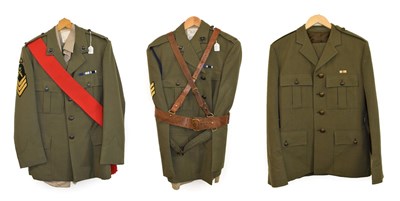 Lot 121 - The Royal Marines: three No.5 Dress Uniforms:- to a Sergeant comprising a lovat green tunic...