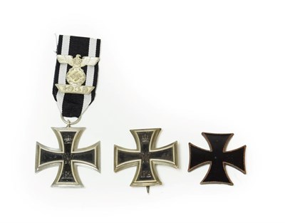 Lot 159 - A First World War German Iron Cross, second class, the ribbon set with 1939 spange; a First...