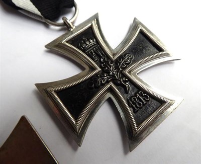 Lot 159 - A First World War German Iron Cross, second class, the ribbon set with 1939 spange; a First...