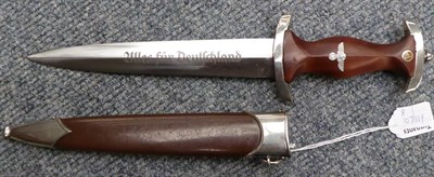 Lot 171 - A German Third Reich Transitional SA Dagger, the 22cm double edge steel blade etched Alles fur...