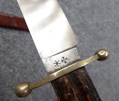 Lot 187 - A Victorian Bowie Knife by Wostenholme, Sheffield, the 24.5cm clip-point steel blade with...