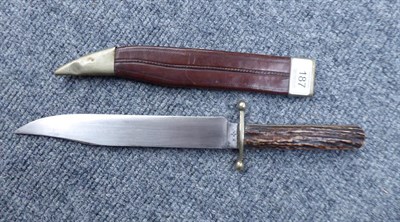 Lot 187 - A Victorian Bowie Knife by Wostenholme, Sheffield, the 24.5cm clip-point steel blade with...