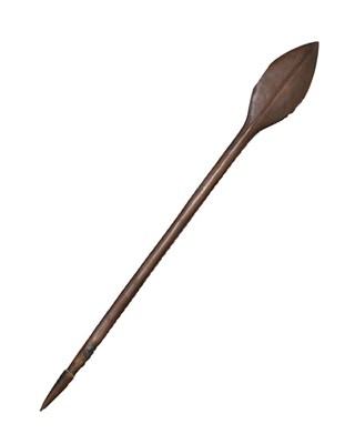 Lot 200 - A Late 19th Century Solomon Islands Paddle Club, of dark brown hardwood, the leaf shape head...