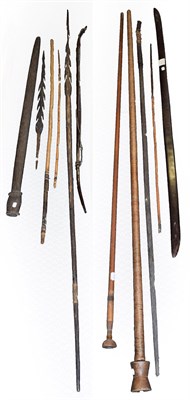 Lot 202 - A Collection of Eleven Various Melanesian Weapons, including two Papua New Guinea palm wood...
