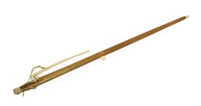 Lot 211 - A 20th Century Inuit Harpoon, the bone tipped hickory haft with bone finger rest, detachable...