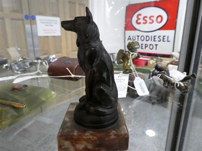 Lot 2000 - A 1920's Bronze Cast Dog Mascot, signed Ruffony, modelled as a seated Alsatian, on a circular base