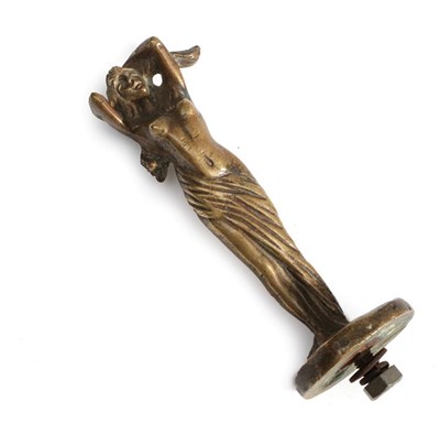 Lot 2008 - C Venee: An Early 20th Century French Brass Car Mascot as the Speed Siren, the nude female...
