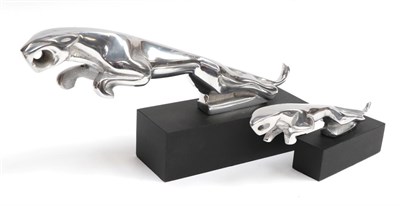Lot 2017 - A Chromed Car Mascot as a Leaping Jaguar, mounted on an ebonised base, 30cm long; and A Similar...