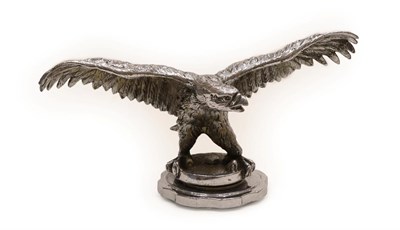 Lot 2018 - A 1930's Nickel on Brass Car Mascot as an Eagle, with wings outstretched standing on a circular...