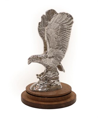 Lot 2021 - Alvis: A 1930's Chrome Plated Car Mascot as an Eagle, mounted on a circular wooden base, 15cm high