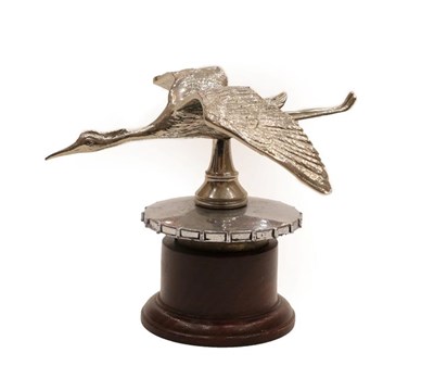 Lot 2025 - A 1920's Chrome on Brass Hispano Suiza Style Flying Stork Car Mascot, mounted on a radiator cap and