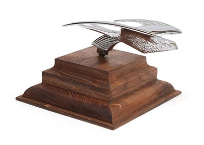 Lot 2035 - An Art Deco Style Chrome Plated Car Mascot as a Stylised Flying Swift, mounted on a graduated...