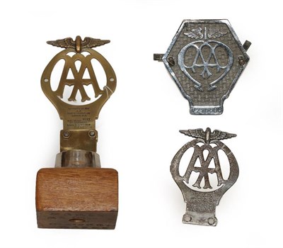 Lot 2056 - A Vintage Brass AA Badge Stamped 27422R, mounted on a wooden base, 12cm high; and Two Vintage...