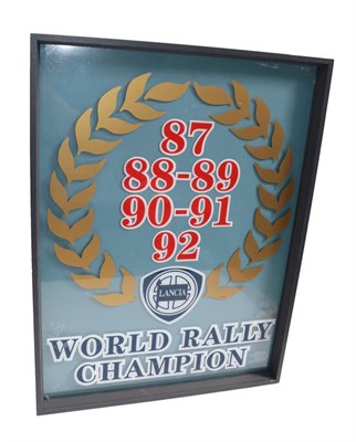 Lot 2147 - Lancia Interest: A Perspex Sign for 1987, 1988, 1989, 1990, 1991 and 1992 World Rally Champion,...