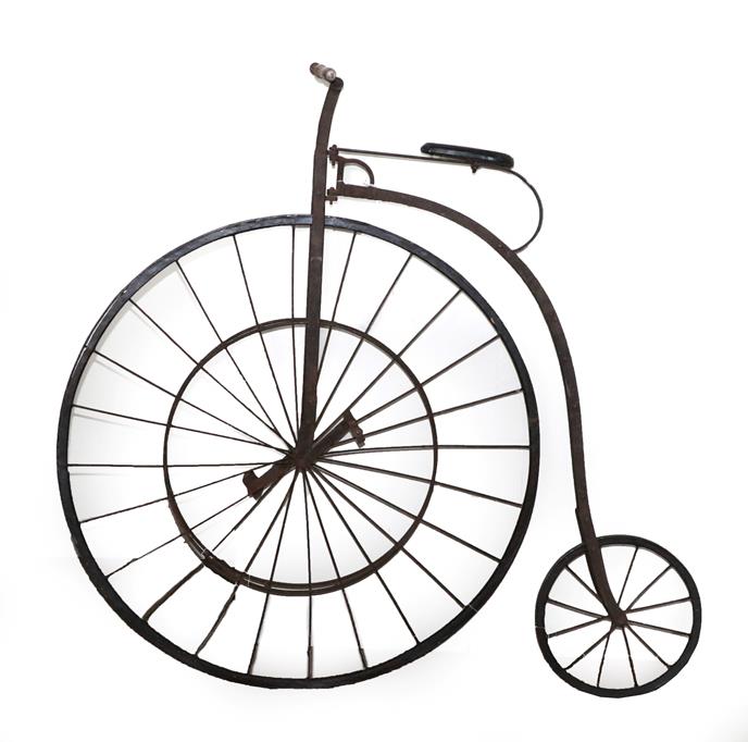 Lot 2210 - A Penny Farthing or Penny Ordinary Bicycle, with spoked and solid wheels, the shaped handle...