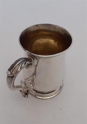 Lot 2001 - A George III Silver Mug, by William Cripps, London, 1762, baluster and on spreading foot, with...