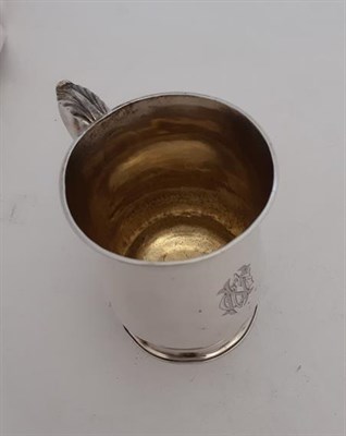 Lot 2001 - A George III Silver Mug, by William Cripps, London, 1762, baluster and on spreading foot, with...