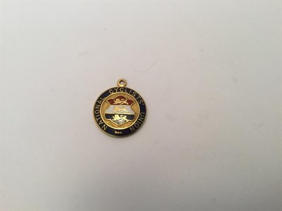 Lot 2054 - An Edward VII Gold and Enamel Medal, by Walter James Carroll, Birmingham, 1907, 15ct, circular, the
