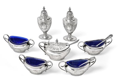 Lot 2068 - An Edward VII Silver Condiment-Set, by Walker and Hall, Sheffield, 1901, each piece part-fluted and