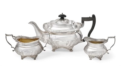 Lot 2094 - A Three-Piece Edward VII Silver Tea-Service, by Thomas Bradbury, London, 1901, each piece in...
