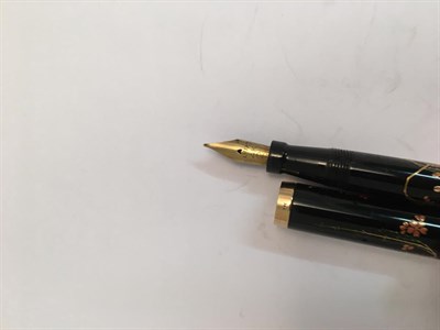 Lot 2107 - A Namiki 14ct Gold-Mounted Fountain-Pen and Pencil, each in black resin and with...
