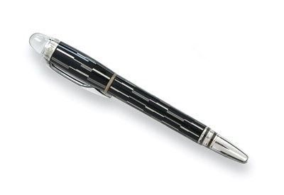 Lot 2113 - A Montblanc Starwalker Black Mystery Rollerball Pen, Numbered GU1023064, the black resin body...