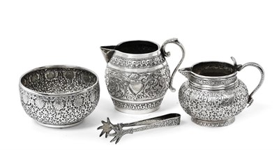 Lot 2119 - Two Indian Silver Cream-Jugs and a Sugar-Bowl, Apparently Unmarked, Late 19th Century, the...