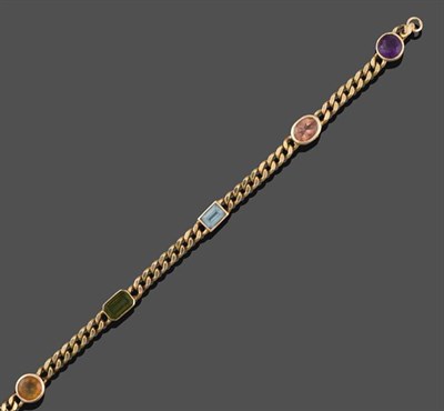 Lot 2139 - A Multi-Gemstone Bracelet, the yellow curb links spaced by a round cut amethyst, an oval cut...