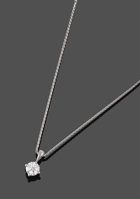Lot 2161 - An 18 Carat White Gold Diamond Solitaire Pendant on An 18 Carat White Gold Chain, the round...
