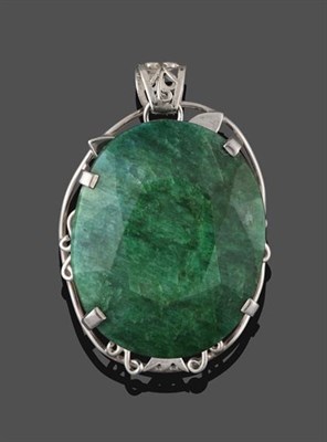 Lot 2168 - An Emerald Pendant, the oval cut emerald in a white claw setting to a scroll border, measures 6.8cm