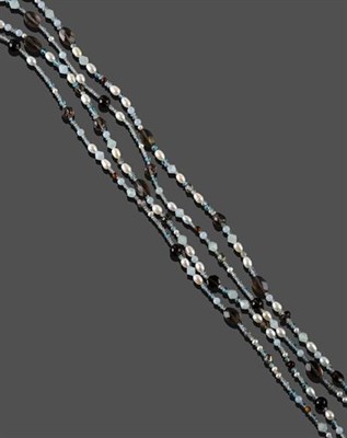 Lot 2170 - A Multi-Gemstone Bead Necklace, cultured pearls spaced by aquamarine, smokey quartz,...