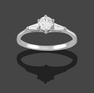 Lot 2181 - A Platinum Diamond Solitaire Ring, the round brilliant cut diamond in a claw setting, to...