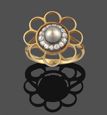 Lot 2191 - A Cultured Pearl and Diamond Cluster Ring, stylised in the form of a flower, the cultured pearl...