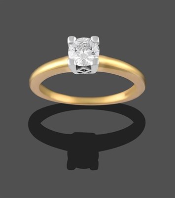 Lot 2235 - An 18 Carat Gold Diamond Solitaire Ring, the round brilliant cut diamond in a white square four...