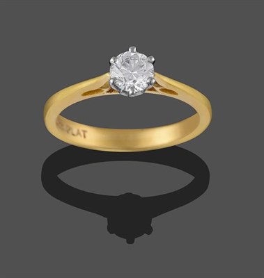 Lot 2247 - An 18 Carat Gold Diamond Solitaire Ring, the round brilliant cut diamond in a white claw...