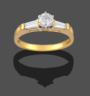 Lot 2250 - An 18 Carat Gold Diamond Solitaire Ring, the round brilliant cut diamond in a white claw...