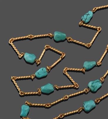 Lot 2255 - A Turquoise Fancy Link Chain, three yellow rope baton links inter-spaced by a turquoise matrix...