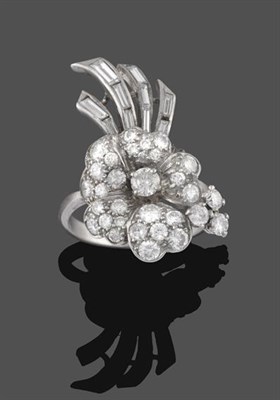 Lot 2258 - A Diamond Floral Spray Ring, realistically modelled as a flower, set throughout with round...