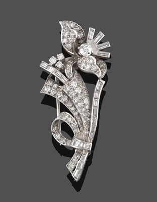 Lot 2260 - A Diamond Floral Spray Brooch, realistically modelled as a ribbon tied flower, set throughout...