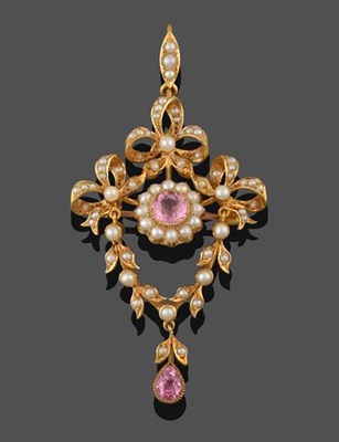 Lot 2263 - An Edwardian Seed Pearl and Pink Tourmaline Brooch/Pendant, a round cut pink tourmaline in a yellow