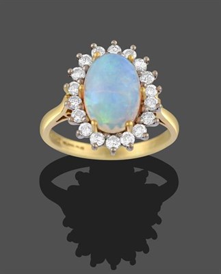 Lot 2274 - An 18 Carat Gold Opal and Diamond Cluster Ring, the oval cabochon opal in yellow claw settings,...