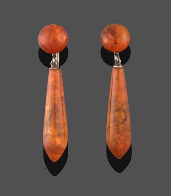 Lot 2294 - A Pair of Amber Drop Earrings, a circular cabochon amber suspends a pear shaped cabochon amber,...