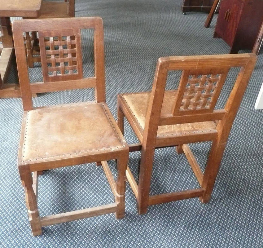 Lot 1515 - A Set of Six Robert "Mouseman" Thompson Oak Dining Chairs, with front rush rail set forward...