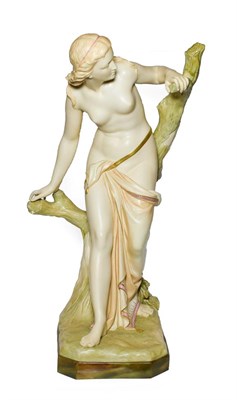Lot 4 - A Royal Worcester Porcelain Figure of The Bather Surprised, 1892, the standing figure loosely...