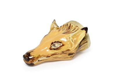 Lot 57 - A Creamware Fox Mask Stirrup Cup, early 19th century, naturalistically modelled and picked out...