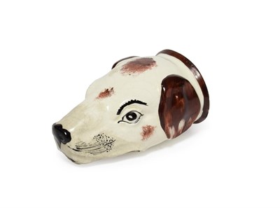Lot 59 - A Staffordshire Pottery Hound's Head Stirrup Cup, mid 19th century, naturalistically modelled...