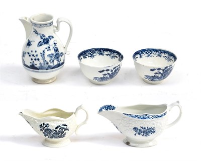 Lot 69 - A Lowestoft Porcelain Sauceboat, circa 1780, printed in underglaze blue with chinoiserie...