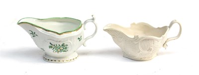 Lot 70 - A Worcester Porcelain Strap Fluted Sauceboat, circa 1770, painted in green and gilt with...