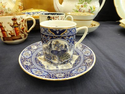 Lot 73 - A Worcester Porcelain Coffee Cup, circa 1770, painted with a Chinese family in a garden; A New Hall