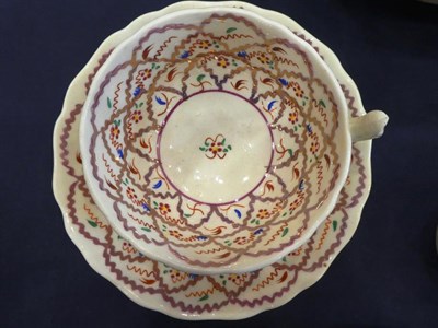 Lot 73 - A Worcester Porcelain Coffee Cup, circa 1770, painted with a Chinese family in a garden; A New Hall